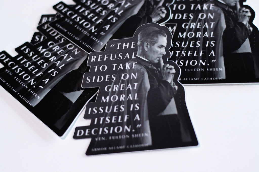 Stickers with a quote by Fulton Sheen on a white surface
